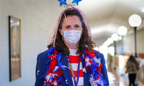 Teacher dressed in red, white and blue